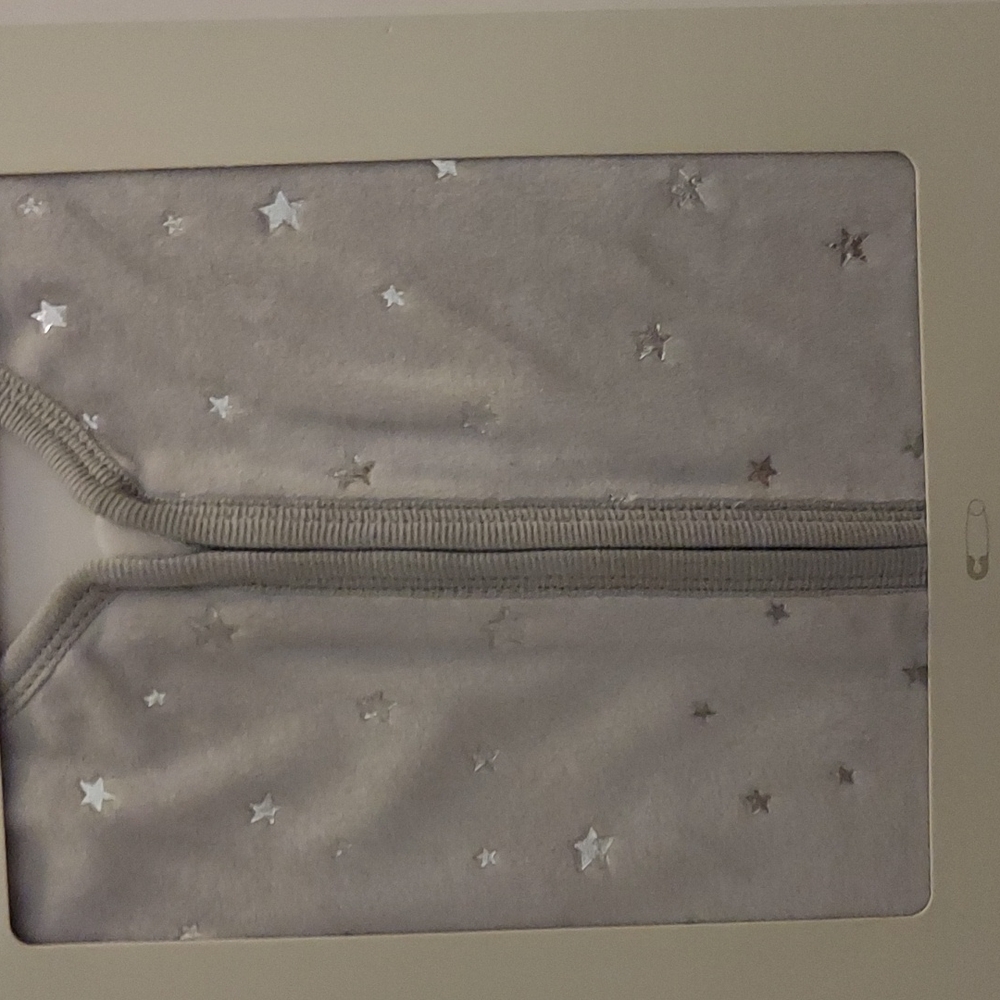 A wearable blanket (sleep sac)